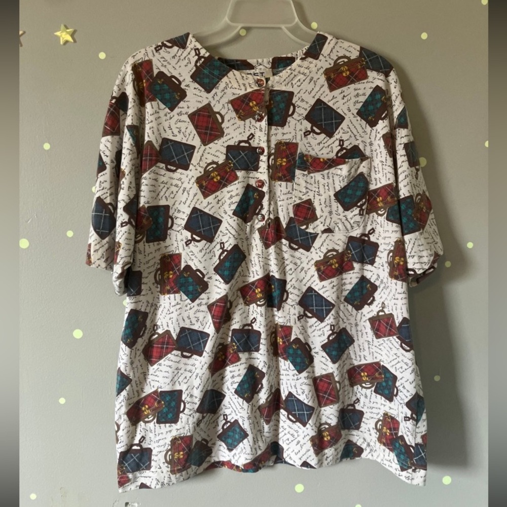 Vintage women’s top with luggage pattern